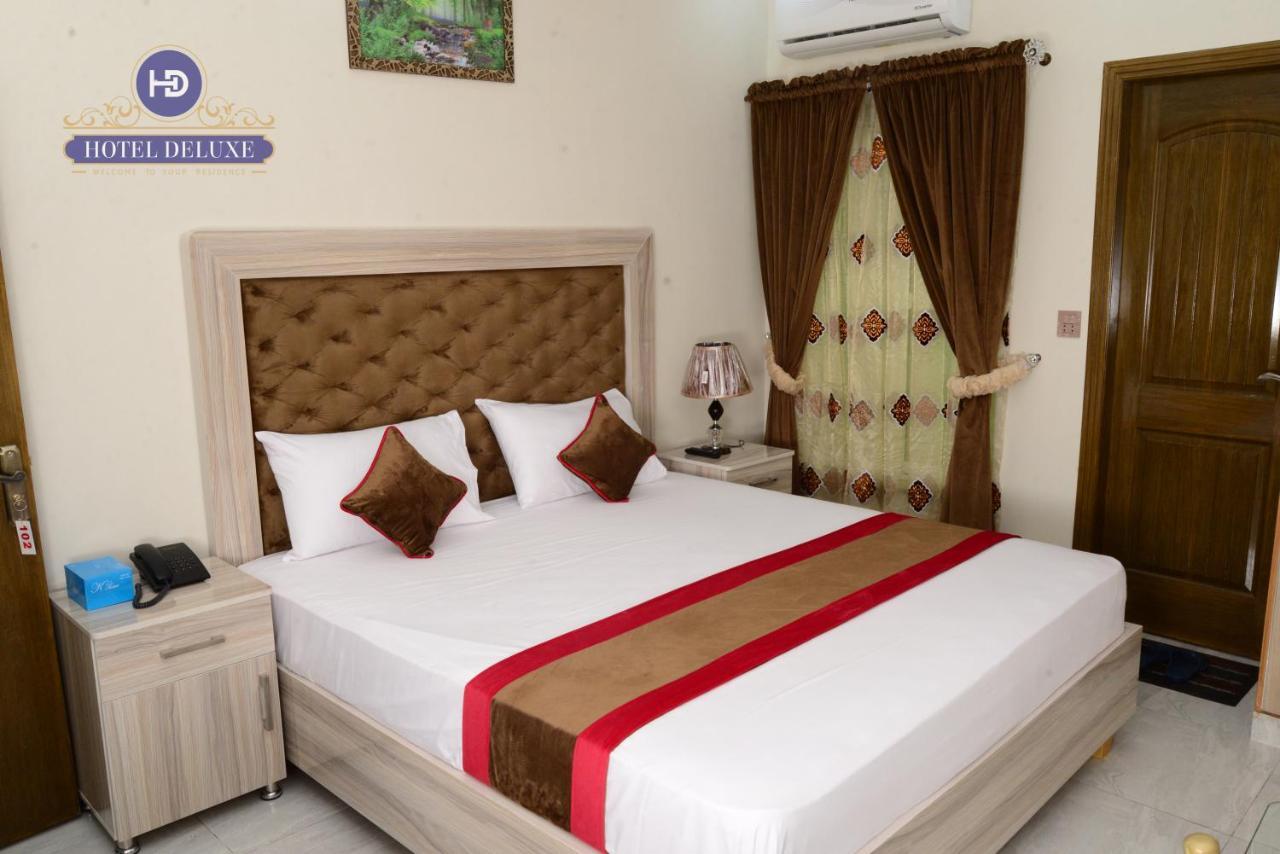 Hotel Deluxe Лахор Экстерьер фото