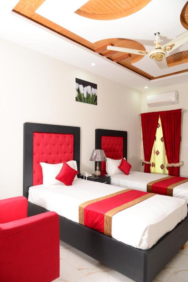 Hotel Deluxe Лахор Экстерьер фото