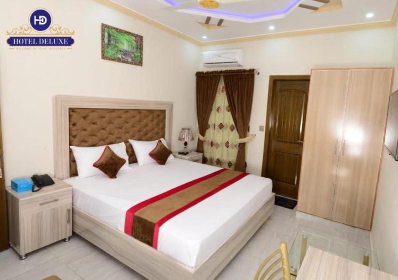 Hotel Deluxe Лахор Экстерьер фото